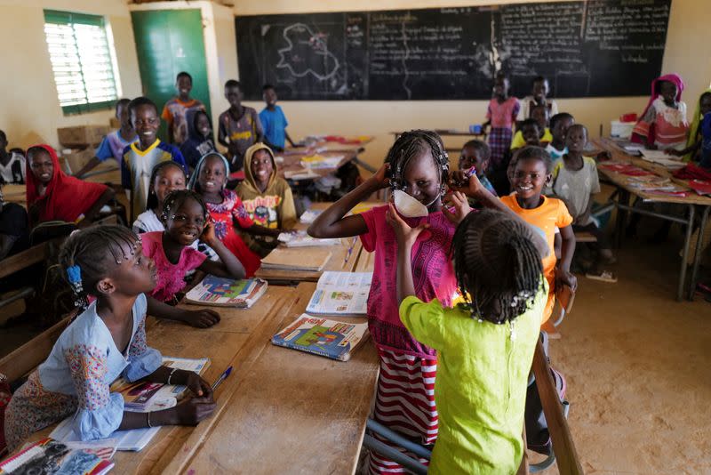 School children attend an awareness course about coronavirus at their classroom in Haliouri village, near Matam