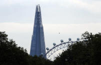 The Shard rises above The London Eye Ferris wheel seen from Hyde Park (Photo by Peter Macdiarmid/Getty Images)
