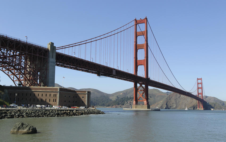 In this photo taken March 9, 2012 the Golden Gate Bridge is shown at Fort Point in San Francisco. It served as a picturesque backdrop for Jimmy Stewart and Kim Novak’s tensely romantic first meeting in “Vertigo” in 1958, made the cover of Rolling Stone in the ‘70s and was nearly decimated by a falling Romulan drill-of-death in 2009’s “Star Trek.” One way or another, the Golden Gate Bridge has packed a lot of history into its 75-year span. (AP Photo/Eric Risberg)