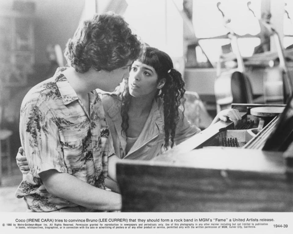 <div class="inline-image__caption"><p>Bruno Martelli (Lee Curreri) tries to convince Coco Hernandez (Irene Cara) that they should form a rock band, in a scene from <em>Fame</em>.</p></div> <div class="inline-image__credit">United Artists</div>