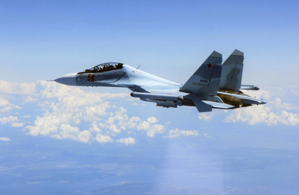 CAPTION CORRECTS AIRCRAFT NAME - In this photo taken on Saturday, June 15, 2019, a Russian Su-30 Flanker fighter flies over the Baltic Sea. Two Royal Air Force jets deployed in Estonia have been scrambled twice in recent days, bringing the number of intercepts of Russian aircraft to eight since taking over the Baltic Air Policing mission in early May. The Typhoon jets were alerted Friday to intercept a Russian Su-30 Flanker fighter, and passed a military transport craft as it was escorting the fighter over the Baltic Sea. In a second incident on Saturday, RAF crews intercepted a Su-30 Flanker fighter and an Ilyushin Il-76 Candid transport aircraft that was traveling north from the Russian enclave of Kaliningrad toward Estonian and Finnish airspace. (UK Ministry of Defence via AP)
