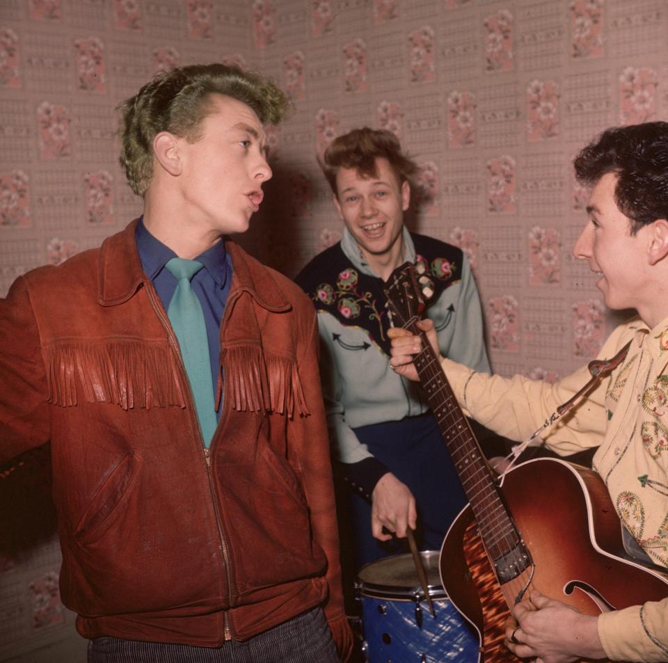 Rock and roll star and regular on the London coffee-house scene, Wee Willie Harris, in 1958 with two members of his band - Rosemary Matthews/BIPs/Getty Images