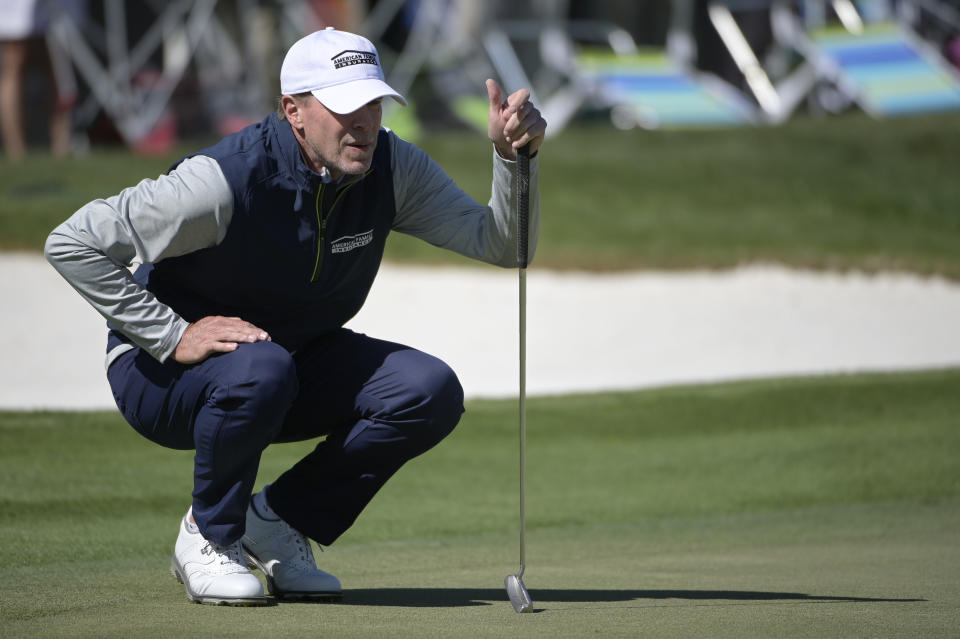 FILE - Steve Stricker lines up his putt on the eighth green during the third round of the Arnold Palmer Invitational golf tournament in Orlando, Fla., in this Saturday, March 7, 2020, file photo. Stricker is keeping busier than ever as Ryder Cup captain and playing the PGA Tour and PGA Tour Champions.(AP Photo/Phelan M. Ebenhack, File)