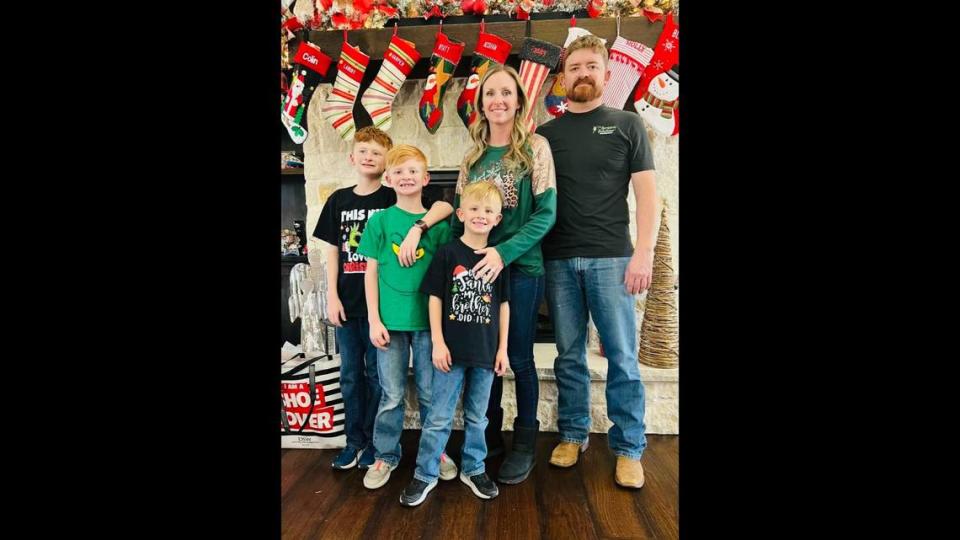 Heath Smith, 40, and his sons Wyatt, 8, and Noah, 6, are survived by his wife, Andrea (second to right), and their eldest son, 11-year-old Colin (far left). 