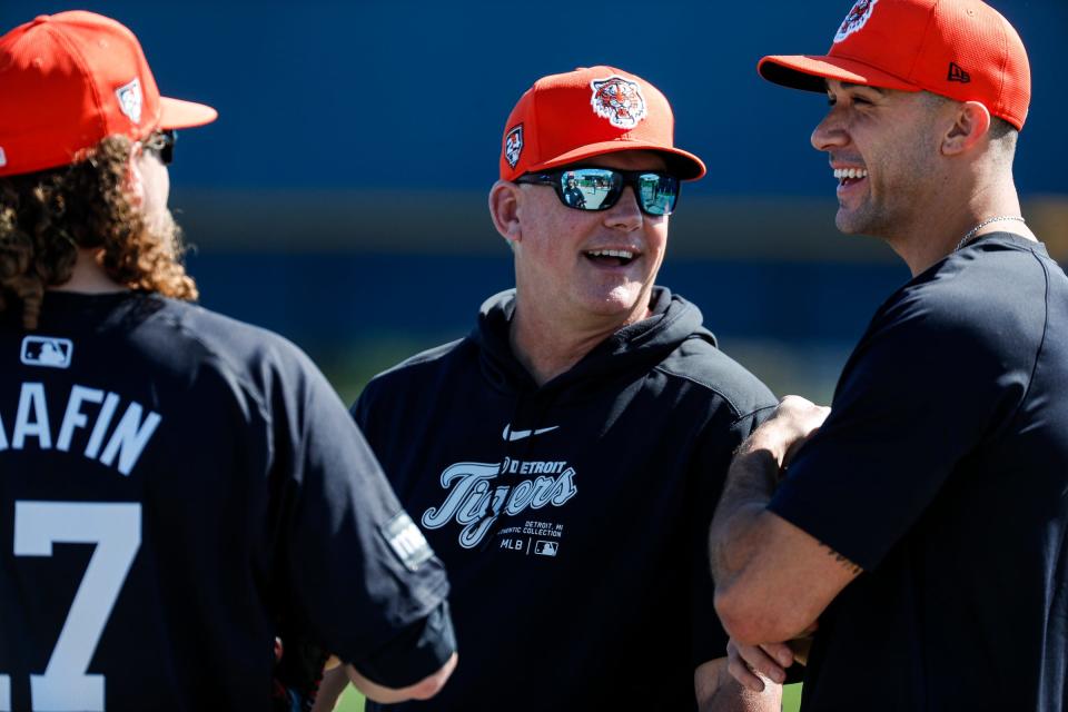 Detroit Tigers manager A.J. Hinch talks to pitcher Andrew Chafin, left, and pitcher Jack Flaherty during spring training at Tigertown in Lakeland, Fla. on Wednesday, Feb. 14, 2024.