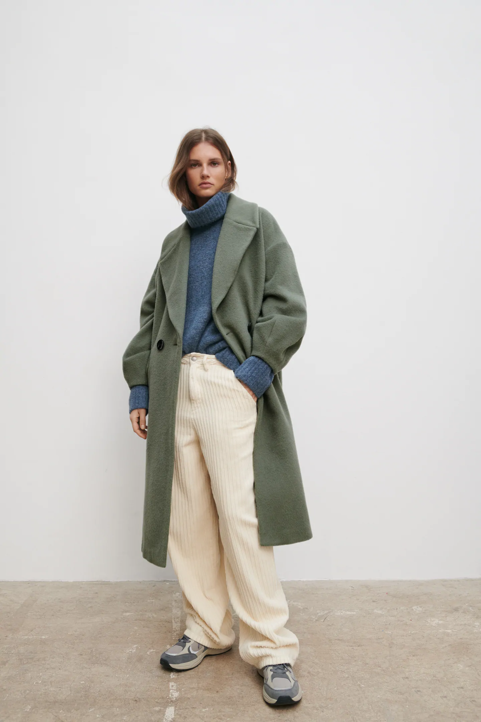 <p>Maybe we've got <em><a href="https://www.instyle.com/fashion/clothing/the-undoing-coats-where-to-shop" rel="nofollow noopener" target="_blank" data-ylk="slk:The Undoing;elm:context_link;itc:0;sec:content-canvas" class="link ">The Undoing</a> </em>on the brain, but we're loving a good coat right now, especially something versatile that can be styled with both dresses and jeans. Zara's olive wool blend option fits the bill, and considering how sleek and warm it looks, the price tag isn't too terrible, either.</p>