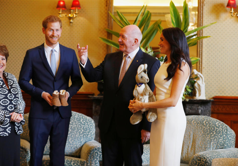 The Duke and Duchess of Sussex were given the Ugg boots by Australia's Governor General Peter Cosgrove and wife Lynne Cosgrove on October 16, 2018 in Sydney, Australia. [Photo: Getty]