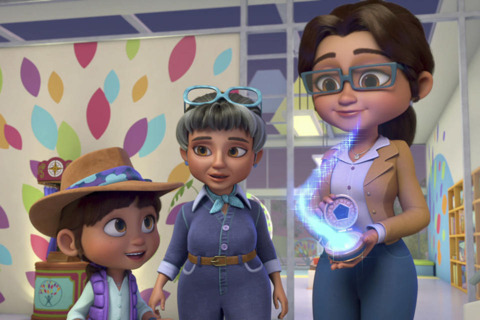 This image released by Netflix shows characters, from left, Ridley, voiced by Iara Nemirovsky, Grandma Jones, voiced by Blythe Danner, and Mama Jones, voiced by Sutton Foster in a scene from the animated series "Ridley Jones." (Netflix via AP)