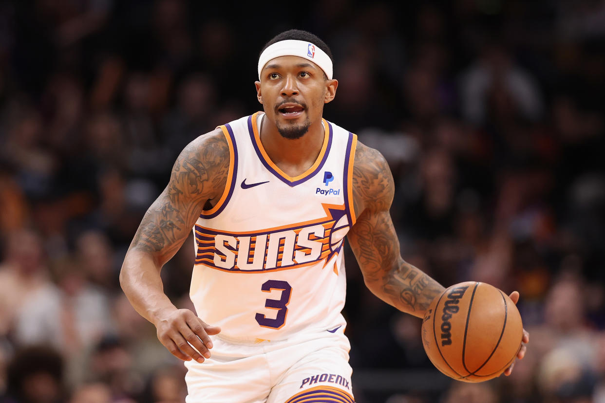 PHOENIX, ARIZONA - DECEMBER 13: Bradley Beal #3 of the Phoenix Suns handles the ball during the NBA game at Footprint Center on December 13, 2023 in Phoenix, Arizona. The Nets defeated the Suns 116-112. NOTE TO USER: User expressly acknowledges and agrees that, by downloading and or using this photograph, User is consenting to the terms and conditions of the Getty Images License Agreement.  (Photo by Christian Petersen/Getty Images)