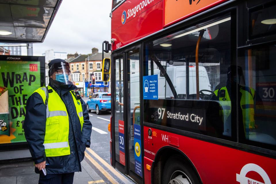 <p>TfL workers take part in a crackdown on bus passengers not wearing masks in Walthamstow</p> (Lucy Young)