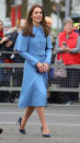 During a visit to Ballymena in Northern Ireland, Kate debuted a new powder blue coat from Mulberry, with a repeat blue Jenny Packham dress underneath and her Rupert Sanderson navy courts. She accessorised with a matching Jimmy Choo clutch bag and Princess Diana’s sapphire and diamond earrings. [Photo: PA]