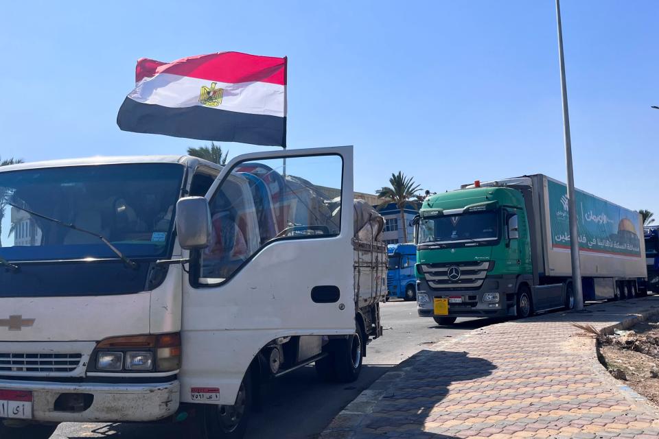 A humanitarian aid convoy for the Gaza Strip is parked in Arish, Egypt (Copyright 2023 The Associated Press. All rights reserved.)