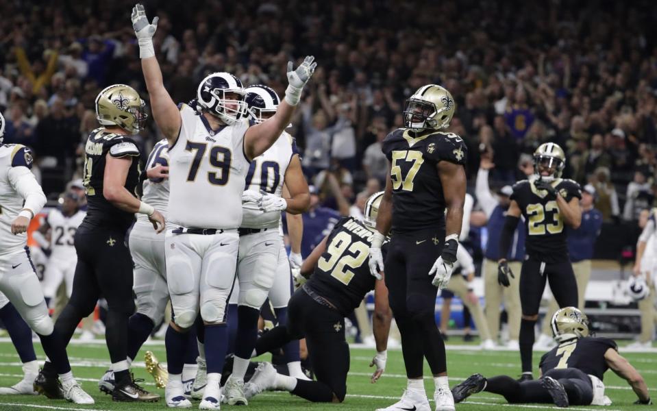 The Rams celebrate Greg Zuerlein's 57-yard winning field goal which is sending them to the Super Bowl - USA TODAY Sports