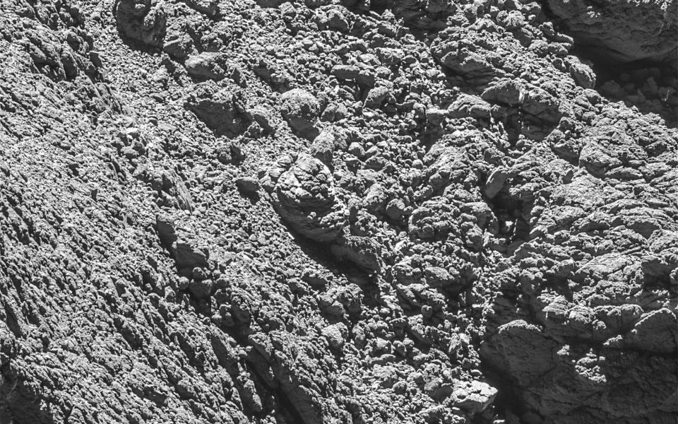 The photo released by European Space Agency ESA on Monday, Sept. 5, 2016 shows a photo of the comet lander Philae in a crack on the right side of a photo taken by Rosetta's OSIRIS narrow-angle camera on Sept. 2, 2016 from a distance of 2.7 km of the Comet 67P/Churyumovâ€“Gerasimenko. Philae was last seen when it first touched down at Agilkia, bounced and then flew for another two hours before ending up at a location later named Abydos, on the cometâ€™s smaller lobe. (ESA/Rosetta/MPS for OSIRIS via AP) - ESA/Rosetta/MPS for OSIRIS via AP/ESA/Rosetta/MPS for OSIRIS via AP