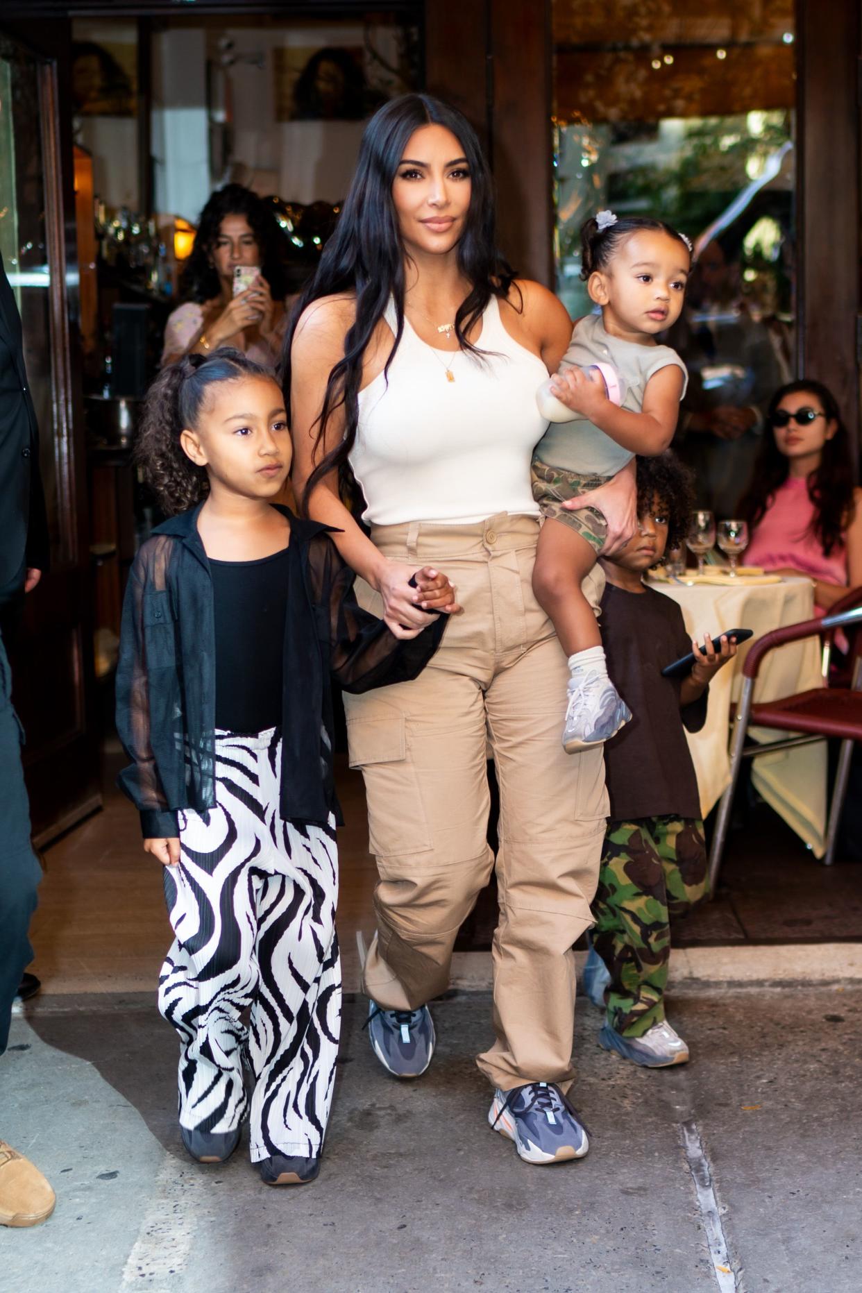 Kim Kardashian Exiting Restaurant with Daughters North and Chicago West