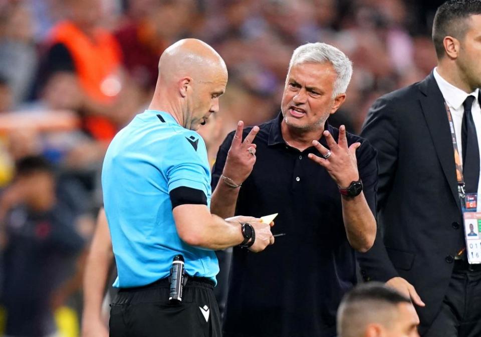 Roma manager José Mourinho exchanges words with referee Anthony Taylor during the UEFA Europa League Final