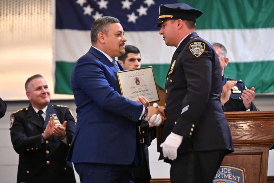 Lt. Conor McDonald was promoted, whose father Steven McDonald was paralyzed after being shot by a teen in the line of duty in 1986. Paul Martinka