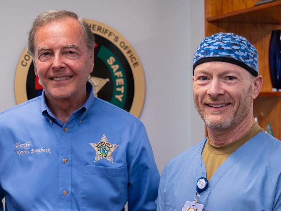 Collier County Sheriff Kevin Rambosk met with Dr. Scott Dunavant, an emergency medicine physician, shortly before Dunavant left for Ukraine to provide medical aide to the war-stricken country on behalf of Global Response Management, a humanitarian organization based out of Yulee, Florida. Dunavant is deputy medical director of the organization. (Provided)