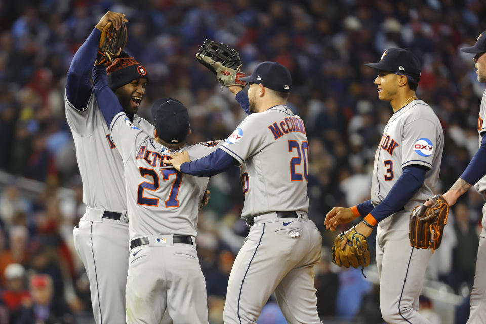The Houston Astros celebrate winning Game 4 of a baseball AL Division Series against the Minnesota Twins, Wednesday, Oct. 11, 2023, in Minneapolis. (AP Photo/Bruce Kluckhohn)