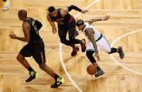 Apr 22, 2016; Boston, MA, USA; Boston Celtics guard Isaiah Thomas (4) drives the ball against Atlanta Hawks forward Thabo Sefolosha (25) during the fourth quarter in game three of the first round of the NBA Playoffs at TD Garden. Mandatory Credit: David Butler II-USA TODAY Sports