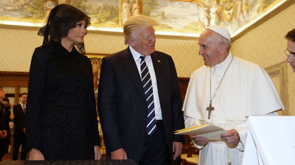 Then-US President Donald Trump and first lady Melania meet Pope Francis during a private audience at the Vatican, May 24, 2017. - Evan Vucci/Reuters