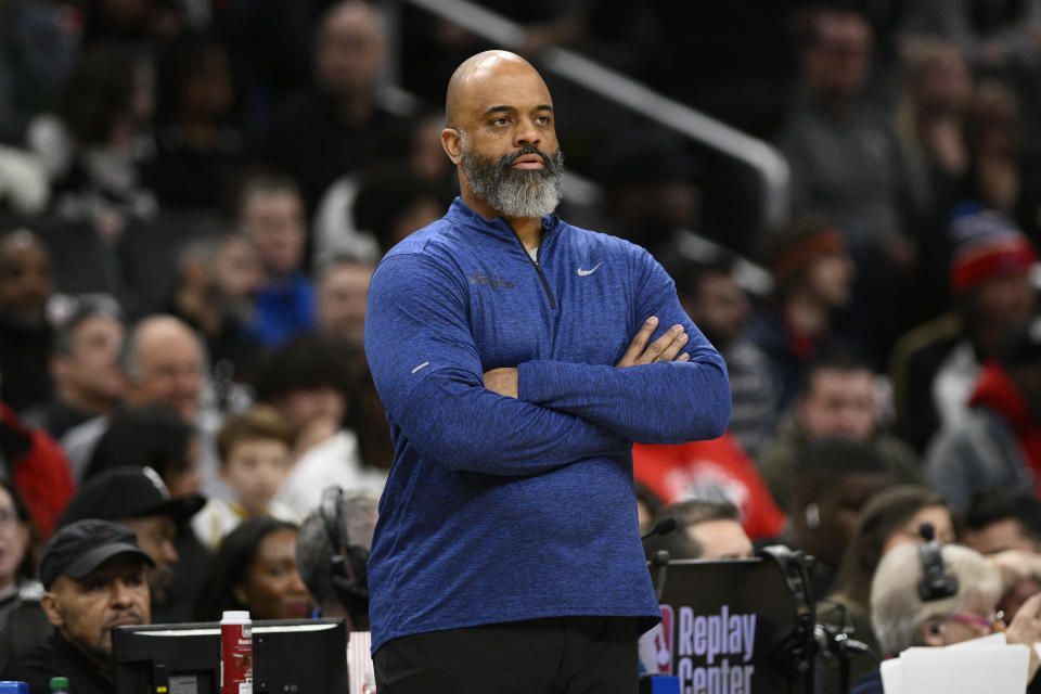 FILE - Washington Wizards head coach Wes Unseld Jr. looks on during the first half of an NBA basketball game against the Denver Nuggets, Sunday, Jan. 21, 2024, in Washington. Unseld Jr. is out as coach of the Washington Wizards midway through his third season with the team, which has the second-fewest wins in the NBA. President Michael Winger announced Thursday, Jan. 25, 2024, that Unseld would be transitioning to a front office advisory role.(AP Photo/Nick Wass, File)