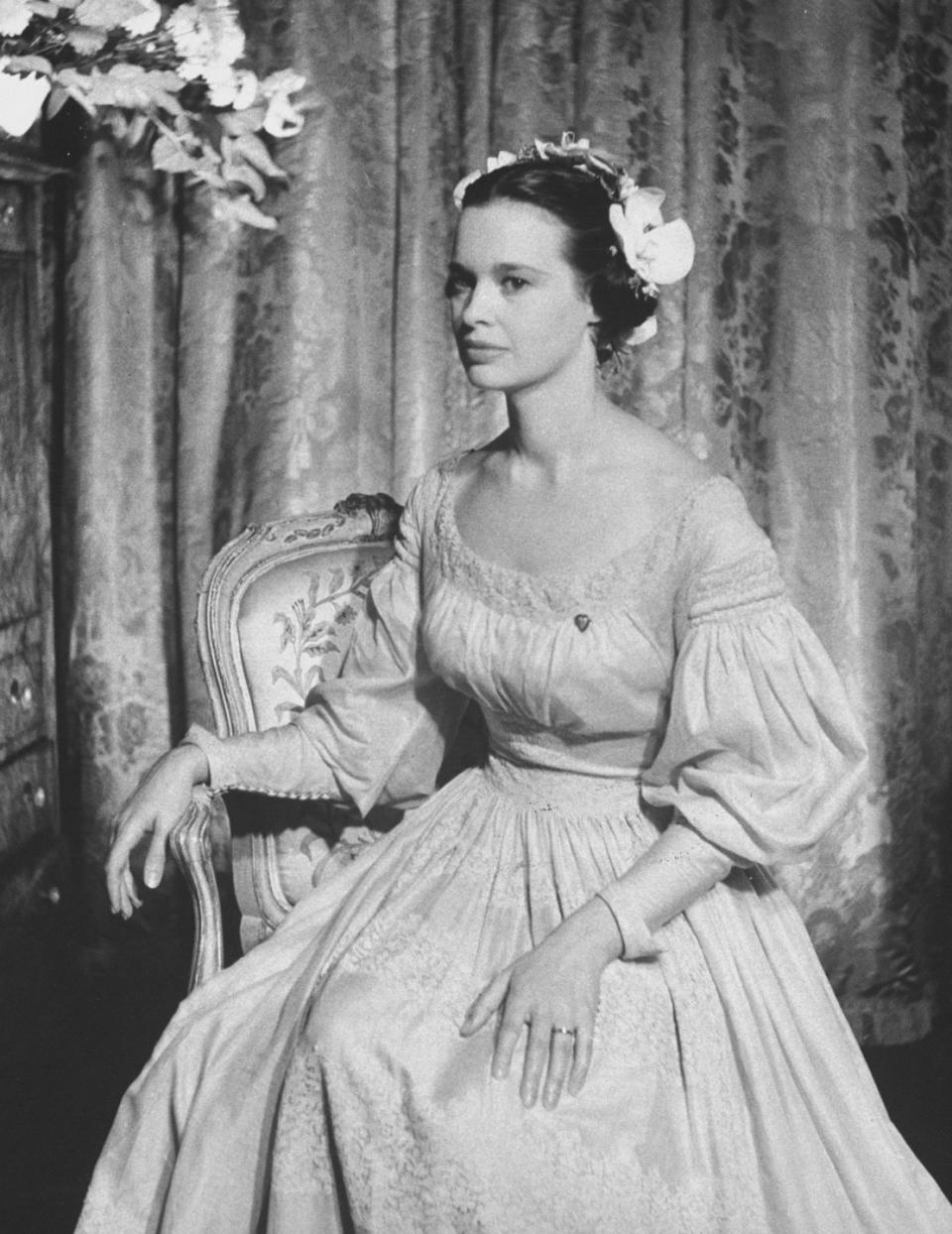 <p>Gloria Vanderbilt's third husband was director Sidney Lumet. They married in 1956 and divorced in 1963, so the relationship was admittedly pretty short-lived. Even so, Gloria looked absolutely stunning on her wedding day, wearing a beige gown rather than the traditional white, which was made out of French linen that dates from 1830. Note: This time, she ditched the pearls. </p>