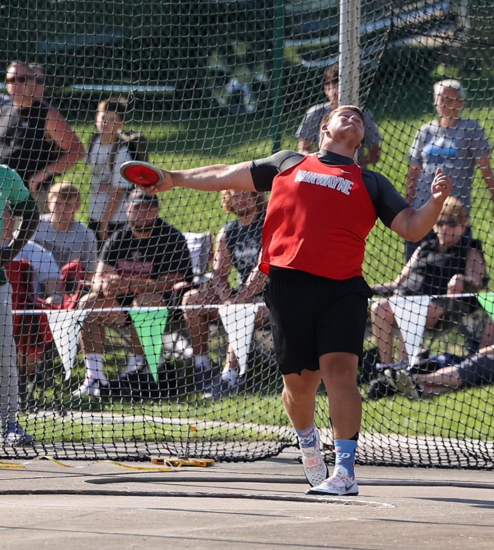 Nrowayne's Colby Morlock keeps the heat up as he fired consistently at a high level to win the discus over his brother Dillon.