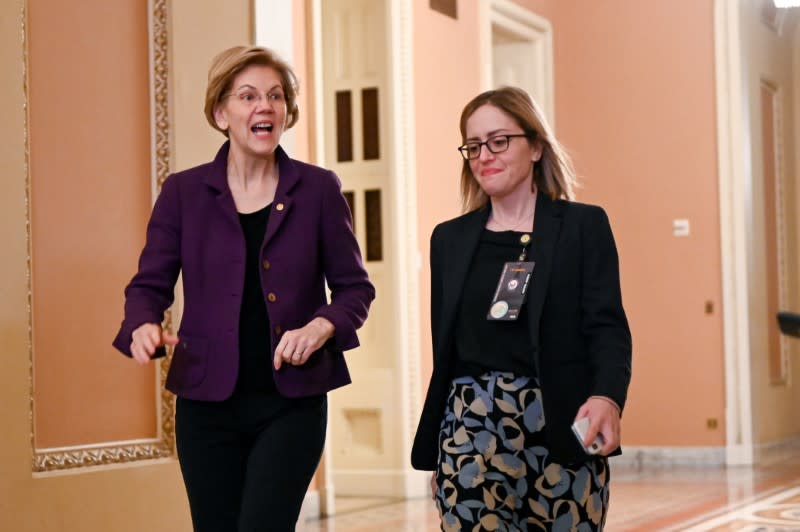 Democratic presidential candidate Sen. Warren walks toward the Senate chamber after a break in the impeachment trial of President Trump