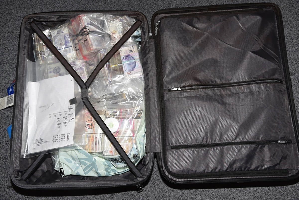 Some of the money found in the possession of Tara Hanlon when she was stopped at Heathrow Airport with suitcases full of cash (National Crime Agency/PA) (PA Media)