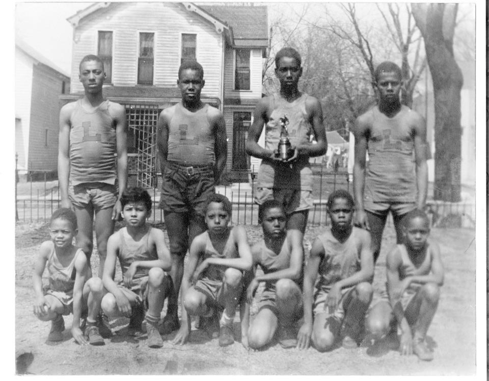 Lincoln Grade School basketball team 1942.Standing, from left: Fredrick Eugene Vaughn, Udell Jeffries, Charles Semmes, Everett HarrisKneeling, from left: Harold Robert Harris, Sterling McElwaine Jr., Ernest Hall, Charles S. Vaughn, Albert Johnson Jr., Durwood Bundrent