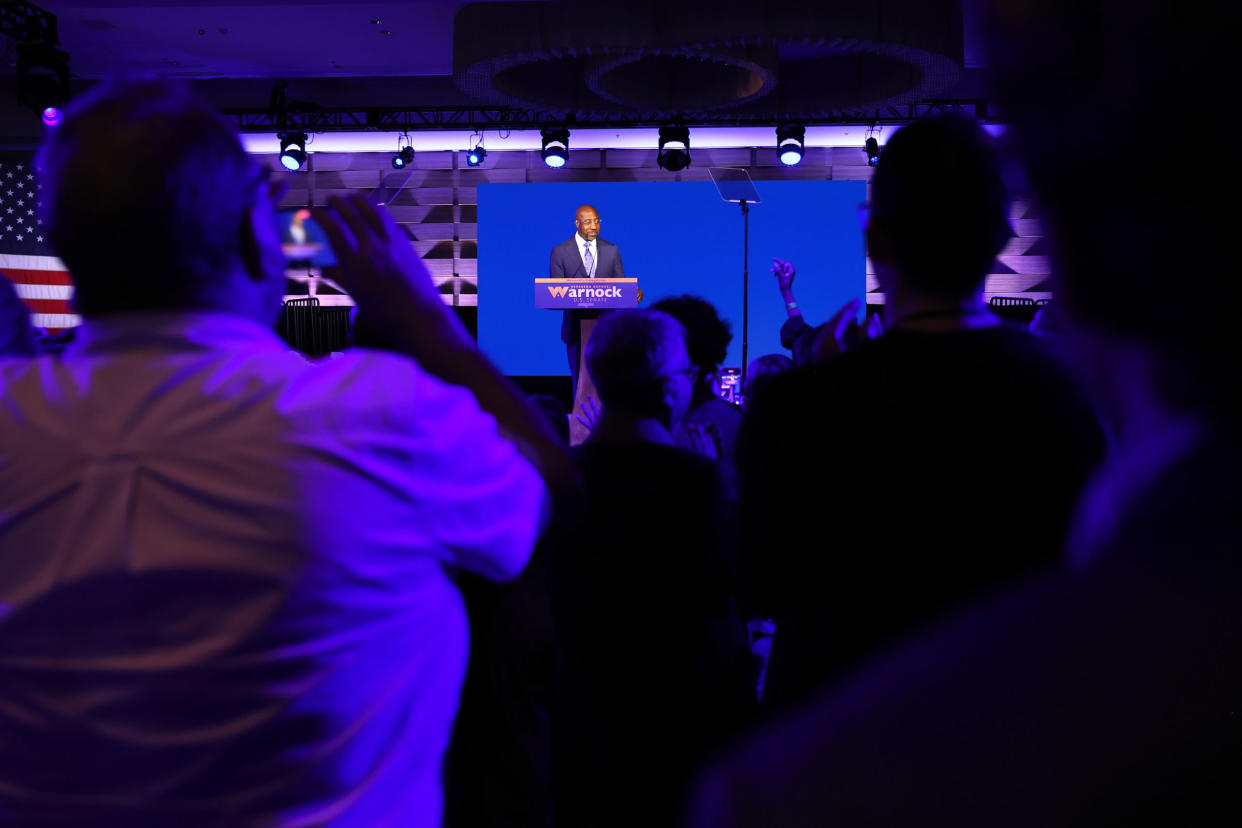 Sen. Raphael Warnock (D-GA) gives a speech at his Election night party in Atlanta on Nov. 8, 2022.