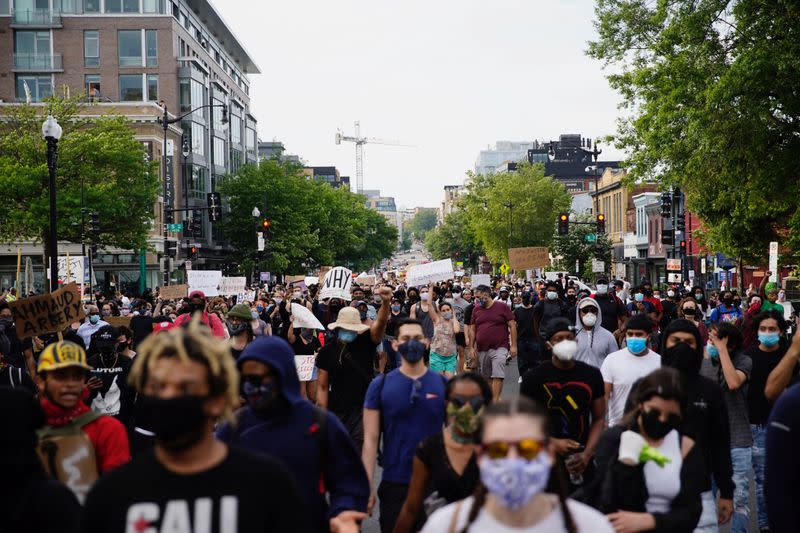 Demonstrators march to the White House as they protest against the death in Minneapolis of George Floyd while marching in Washington