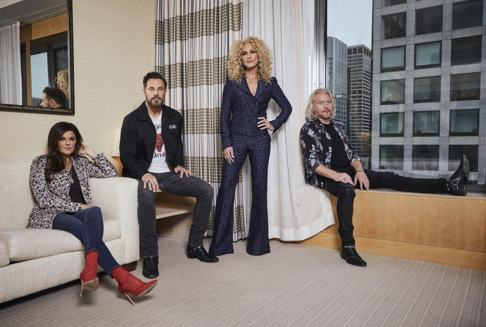 This Jan. 13, 2020 photo shows members of the country group Little Big Town, from left, Karen Fairchild, Jimi Westbrook, Kimberly Schlapman and Phillip Sweet posing for a portrait in New York to promote their new album "Nightfall," out on Friday. (Photo by Matt Licari/Invision/AP)