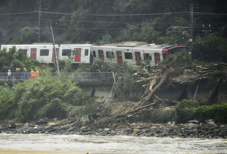Derailed train caused by a landslide following heavy rain is seen in Karastu, southwestern Japan, in this photo taken by Kyodo July 7, 2018. Mandatory credit Kyodo/via REUTERS