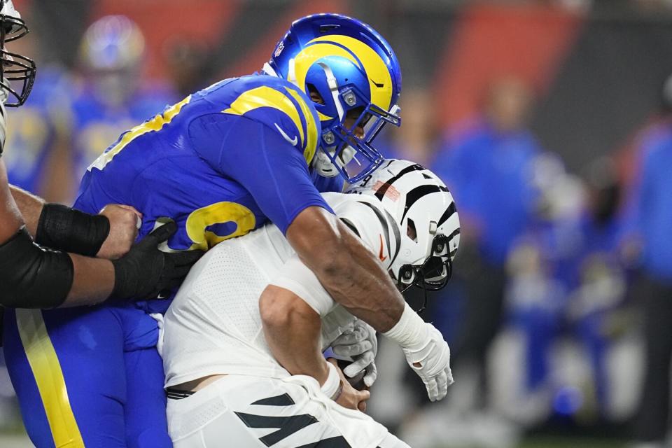 The Rams' Aaron Donald sacks Joe Burrow.