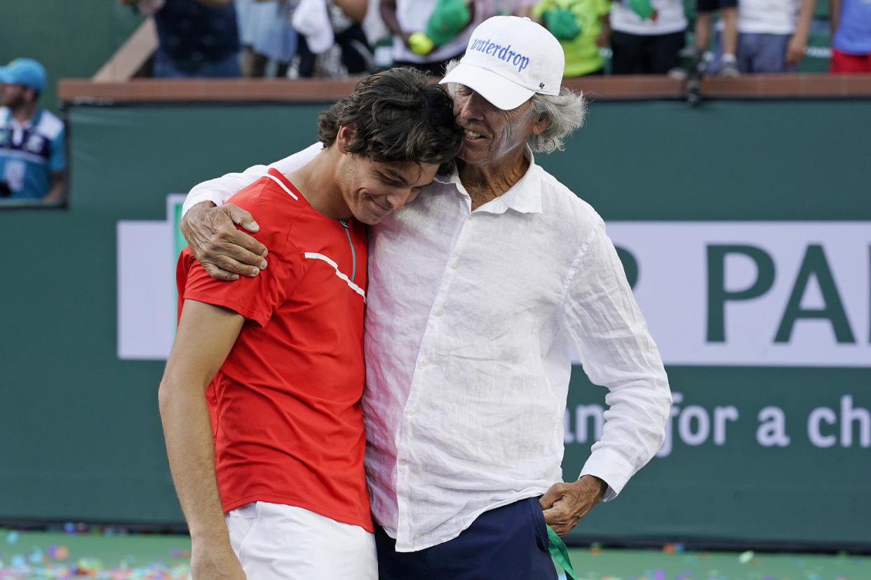 Taylor Fritz and his father Guy Fritz. (Marcio Jose Sanchez / AP)