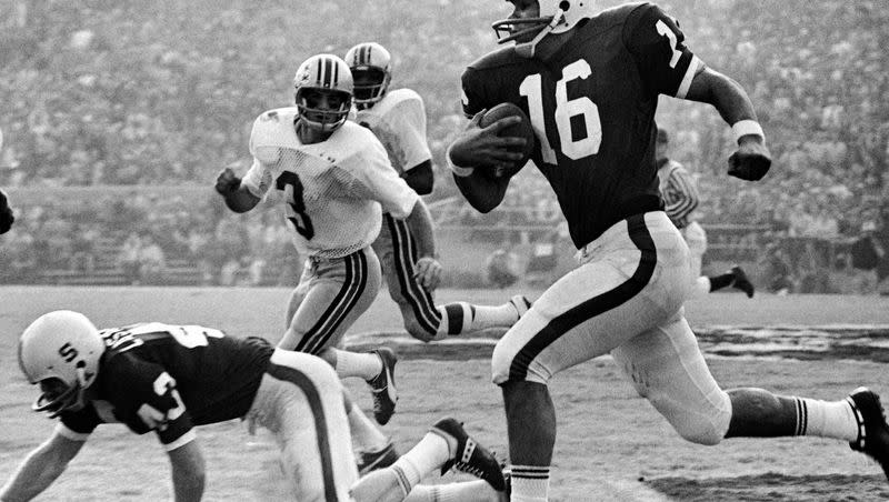 Jim Plunkett of Stanford, a hero in Friday’s Rose Bowl upset victory over Ohio State, sprints through the Buckeye defense for a 22-yard gain to midfield in Pasadena, California on Jan. 2, 1971.