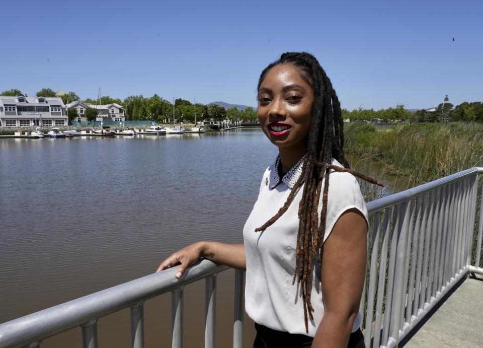 Suisun City Mayor Pro Tem Princess Washington stands next to the Suisun Slough in Suisun City on April 30, 2024. She's part of a coalition called California Together that opposes the new Solano County city proposed by California Forever. (AP Photo/Terry Chea)
