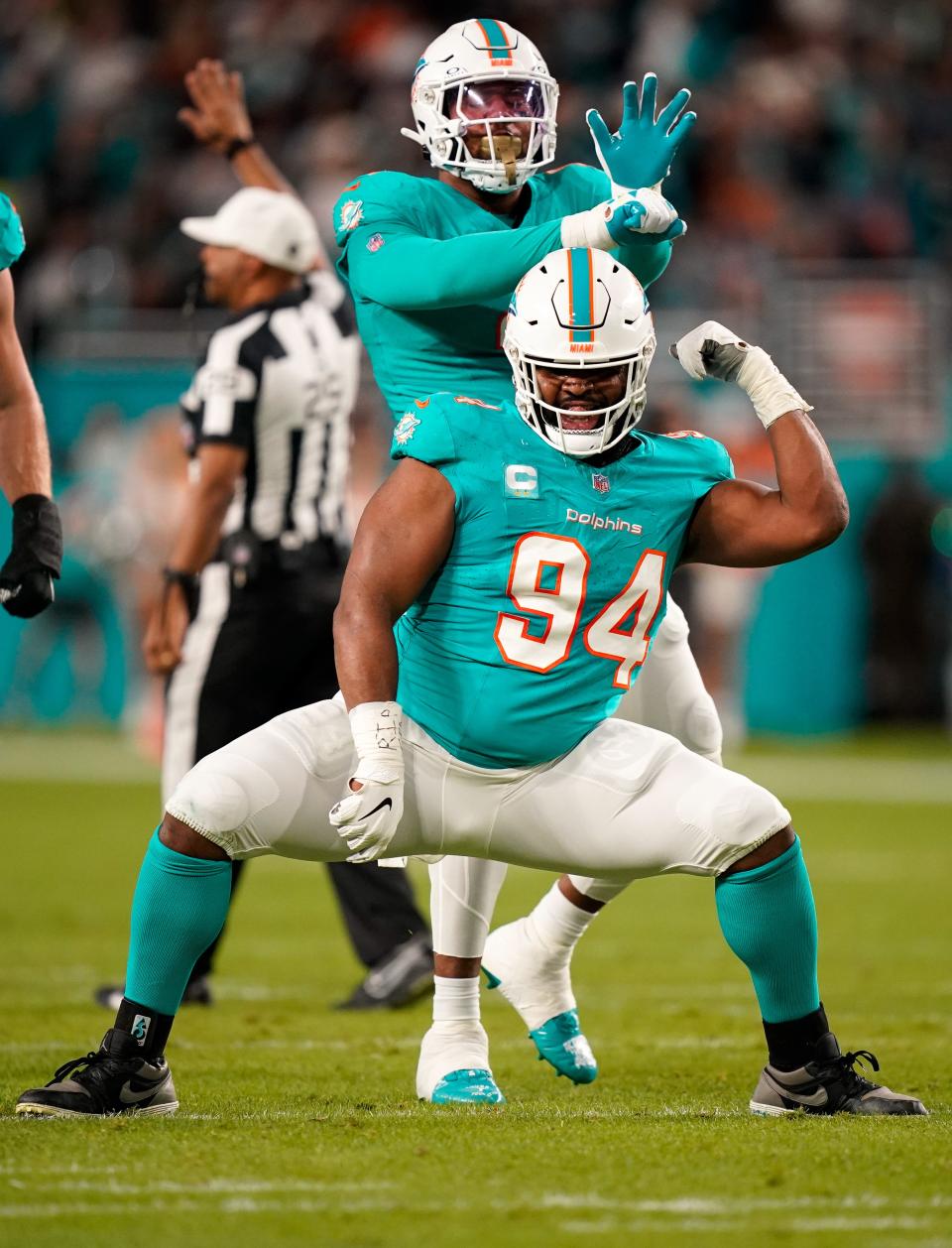 Dolphins defensive tackle Christian Wilkins celebrates a sack against Tennessee's Will Levis.