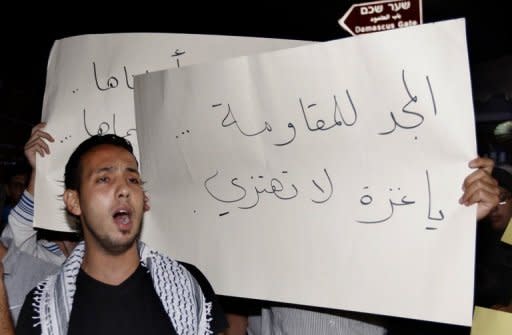 Palestinians protest against Israel's ongoing military operation in the Gaza Strip at the Damascus Gate in Jerusalem's Old City on August 21. An Israeli air strike killed a Palestinian militant and wounded another in the Gaza Strip, just days after armed groups agreed to halt rocket attacks on southern Israel