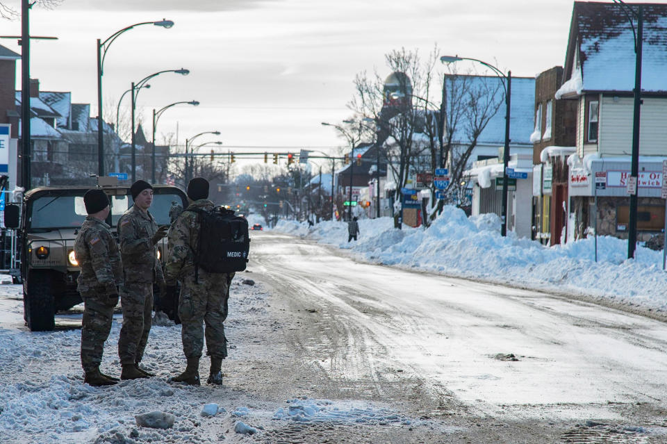 Members of the National Guard assist in recovery efforts in Buffalo (Jorge Uzon / AFP via Getty Images)
