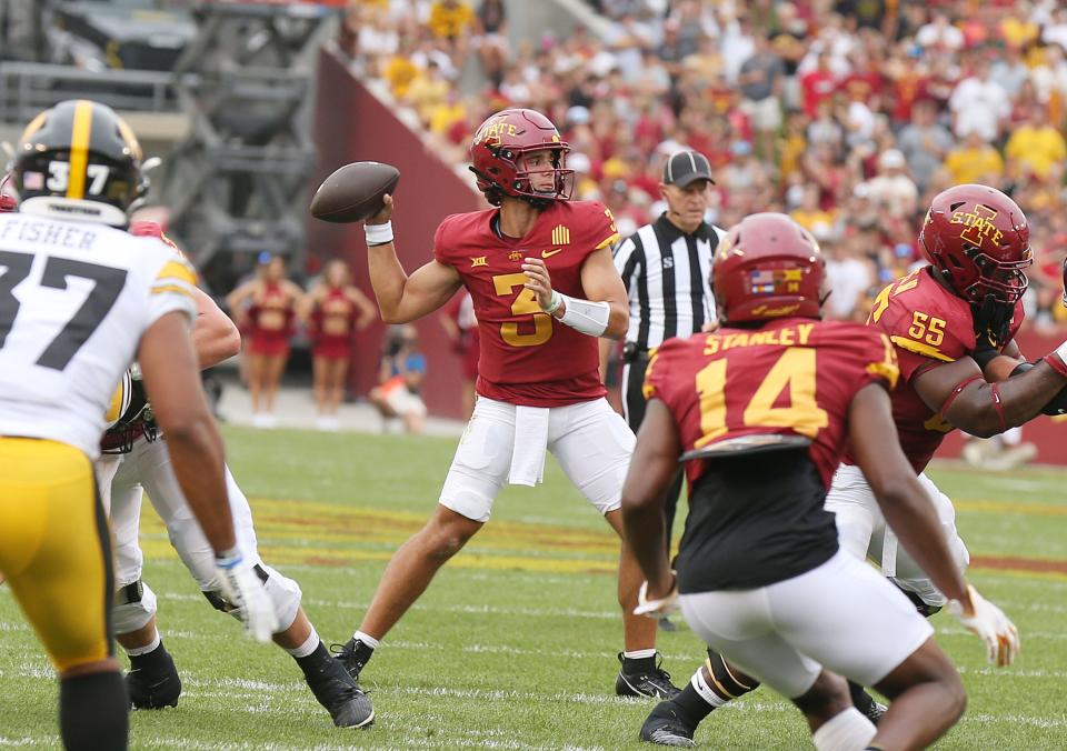 Iowa State quarterback Rocco Becht (3) throws the ball against Iowa during the first quarter of the Cy-Hawk game Saturday. The Cyclones lost 20-13.
