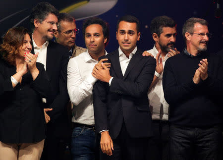 5-Star new leader Luigi Di Maio is congratulated during a gathering in Rimini, Italy, September 23, 2017. REUTERS/Max Rossi