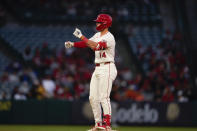 Los Angeles Angels' Logan O'Hoppe gestures after hitting a double to score Taylor Ward during the third inning of a baseball game against the Baltimore Orioles, Tuesday, April 23, 2024, in Anaheim, Calif. (AP Photo/Ryan Sun)