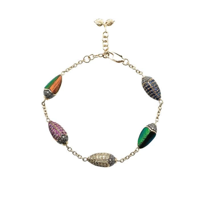 <p><a class="link " href="https://bibivandervelden.com/products/scarab-multicolor-bracelet?_pos=3&_sid=e2518c557&_ss=r" rel="nofollow noopener" target="_blank" data-ylk="slk:SHOP NOW;elm:context_link;itc:0;sec:content-canvas">SHOP NOW</a></p><p>Famed for her innovative use of materials and her ability to reinterpret all things creepy into desirable, wearable art, the Amsterdam-based designer Bibi Van Der Velden manages to make shimmering scarab beetles into something positively charming. </p><p>Yellow gold and multi-coloured diamond and sapphire bracelet, £5,673, Bibi Van Der Velden</p>