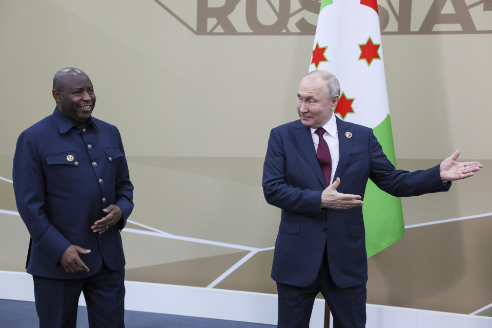 Russian President Vladimir Putin, right, and President of the Republic of Burundi Evariste Ndayishimiye meet on the sidelines of the Russia Africa Summit in St. Petersburg, Russia, Thursday, July 27, 2023. (Mikhail Metzel/TASS Host Photo Agency Pool Photo via AP)