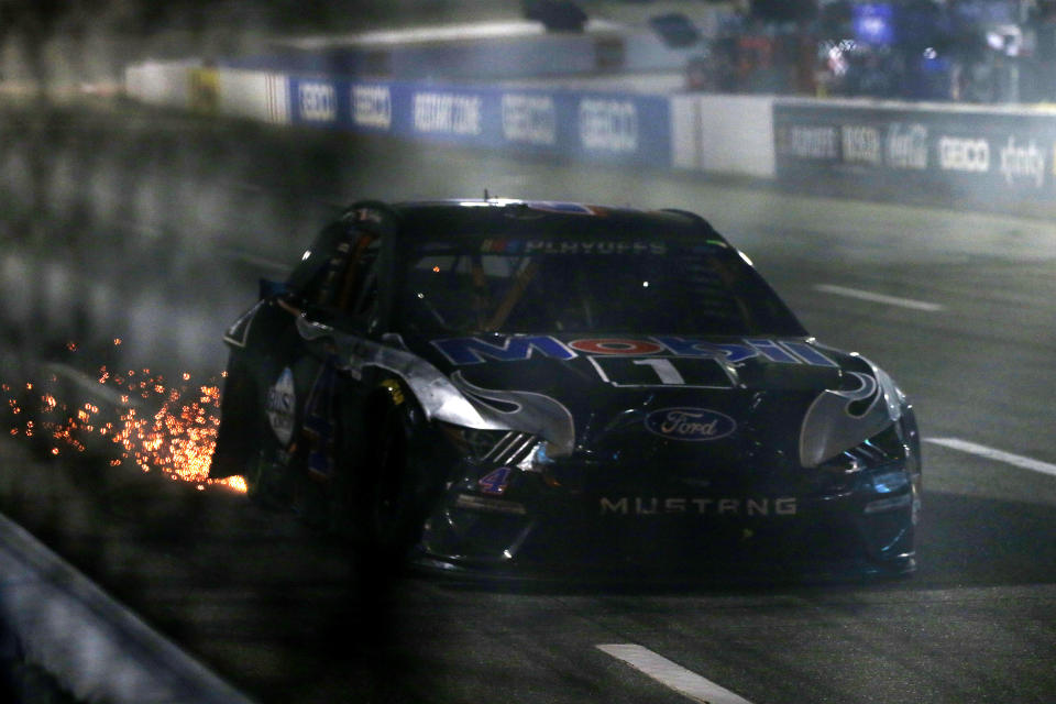 MARTINSVILLE, VIRGINIA - NOVEMBER 01: Kevin Harvick, driver of the #4 Mobil 1 Ford, drives with sparks after an on-track incident on the last lap of the NASCAR Cup Series Xfinity 500 at Martinsville Speedway on November 01, 2020 in Martinsville, Virginia. (Photo by Brian Lawdermilk/Getty Images)