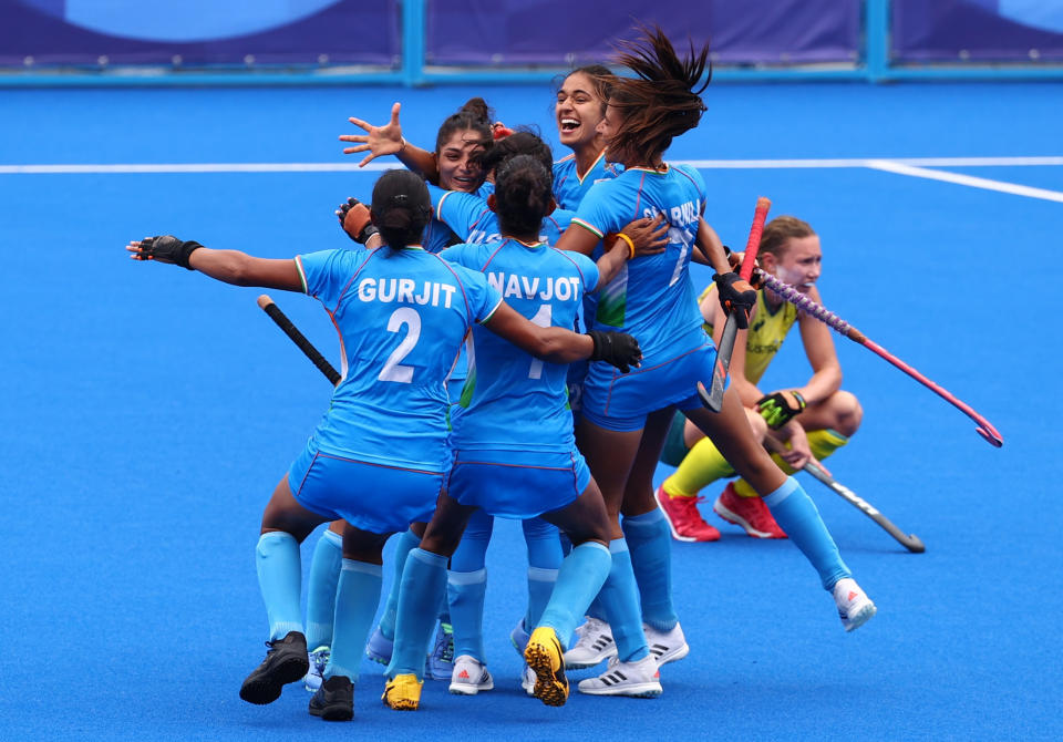 Tokyo 2020 Olympics - Hockey - Women - Quarterfinal - Australia v India - Oi Hockey Stadium, Tokyo, Japan - August 2, 2021. Players of India celebrate after winning their match. REUTERS/Bernadett Szabo