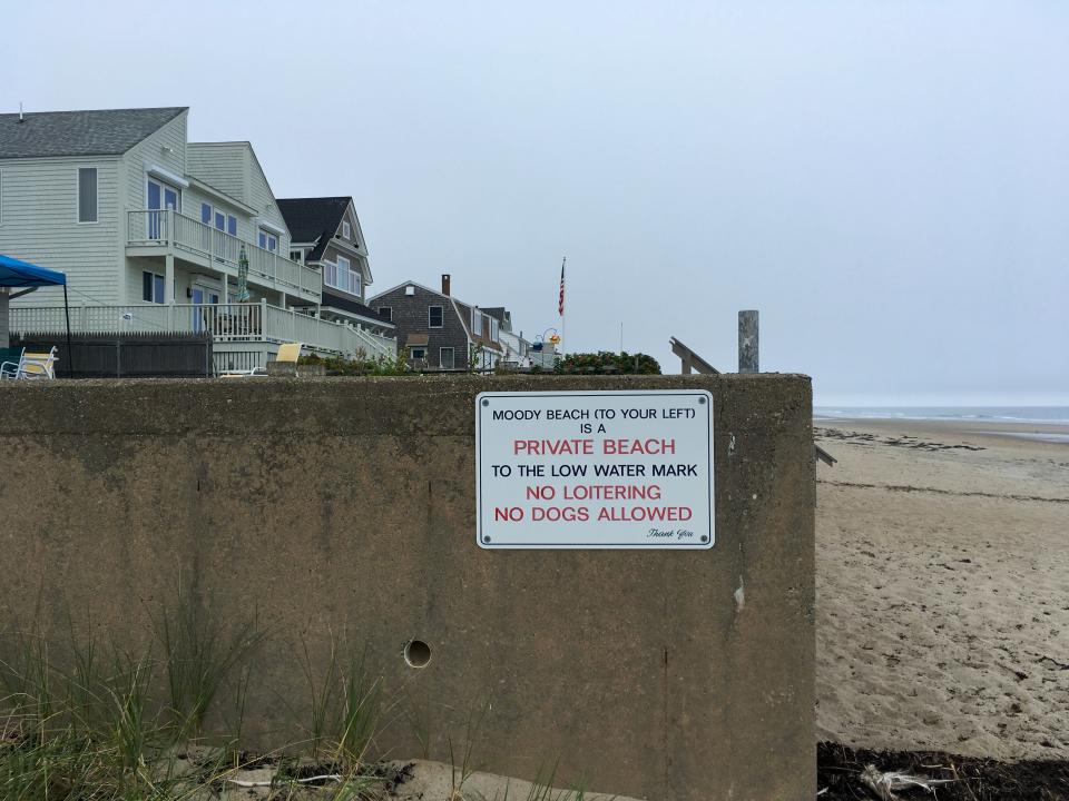 A sign at the boundary between North Beach in Ogunquit and Moody Beach in Wells, shown here in September 2017, advises beachgoers that Moody Beach is private "to the low water mark."